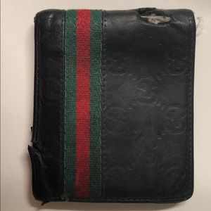 Men’s bifold Gucci wallet